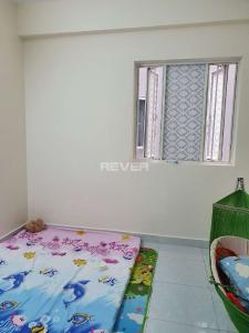 Phòng ngủ căn hộ Tani Building Sơn Kỳ 1 Căn hộ Tani Building Sơn kỳ 1 kèm nội thất cơ bản, view nội khu.