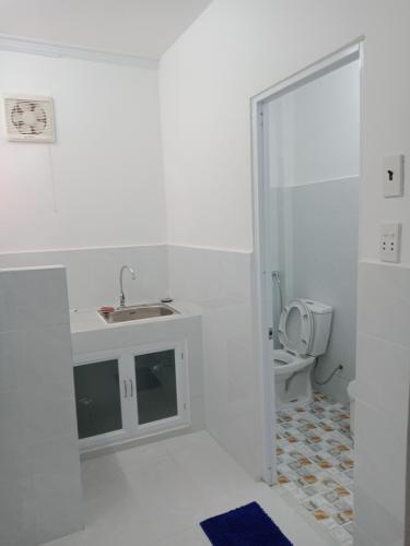 Bếp nhà phố Nhà phố Quận 7 hướng Tây diện tích đất 3mx7m, hẻm xe máy.