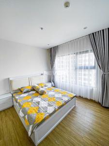 Phòng ngủ Vinhomes Grand Park Quận 9 Căn hộ Vinhomes Grand Park tầng trung, nội thất hiện đại.