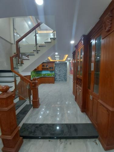 Không gian nhà phố Quận Gò Vấp Nhà phố diện tích 64m2, kết cấu 1 trệt 3 lầu và sân thượng, sổ hồng riêng.