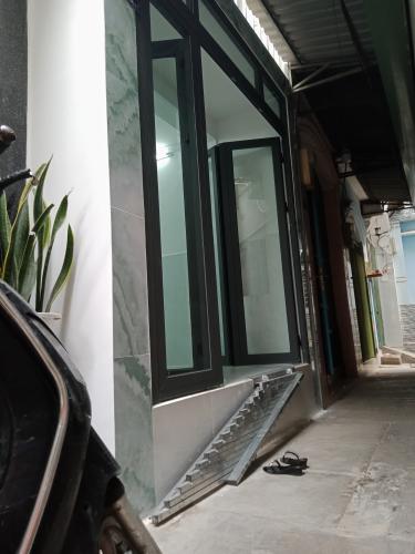 Mặt tiền nhà phố Nhà phố Quận 7 hướng Tây diện tích đất 3mx7m, hẻm xe máy.