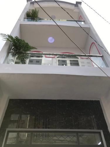 Mặt tiền nhà phố Quận Tân Phú  Nhà phố Quận Tân Phú hẻm xe hơi rộng 4m, sổ hồng riêng.