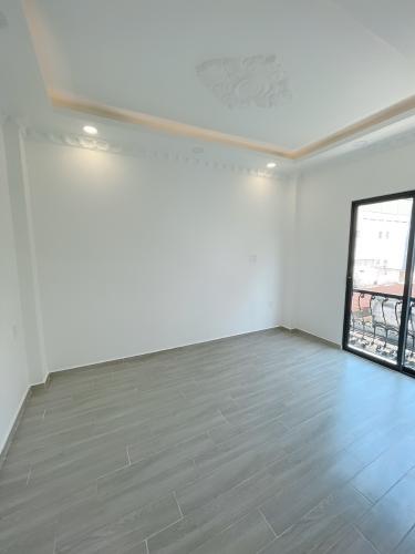 Phòng ngủ nhà phố Quận Bình Thạnh Nhà phố có 2 mặt tiền hẻm xe hơi hướng Bắc thoáng mát, sổ hồng riêng.