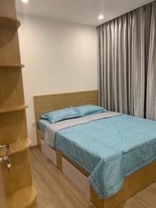 Phòng ngủ Vinhomes Grand Park Quận 9 Căn hộ Vinhomes Grand Park tầng trung hướng về phía sông.