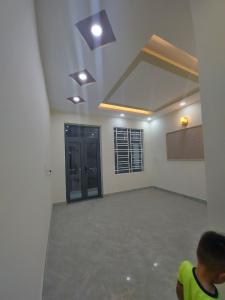 Không gian nhà phố Quận Gò Vấp Nhà phố diện tích 64m2, kết cấu 1 trệt 3 lầu và sân thượng, sổ hồng riêng.