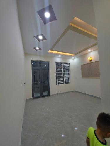 Không gian nhà phố Quận Gò Vấp Nhà phố diện tích 64m2, kết cấu 1 trệt 3 lầu và sân thượng, sổ hồng riêng.