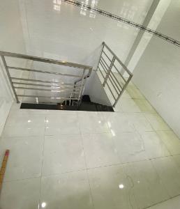 Nhà phố Quận Gò Vấp Nhà phố kết cấu 1 trệt 2 lầu và sân thượng hướng Tây Nam, sổ hồng riêng.