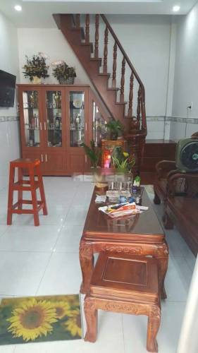 Nhà phố Quận 12 Nhà phố thiết kế 1 trệt và 1 lầu cửa hướng Tây Nam, khu đầy đủ tiện ích.