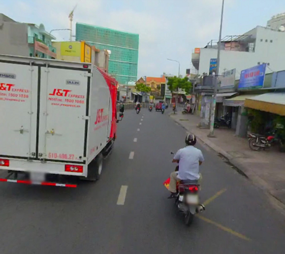 Đường trước nhà phố Quận Tân Phú Nhà phố cửa hướng Đông Bắc, thiết kế 1 trệt, 1 lửng và 2 lầu kiên cố.