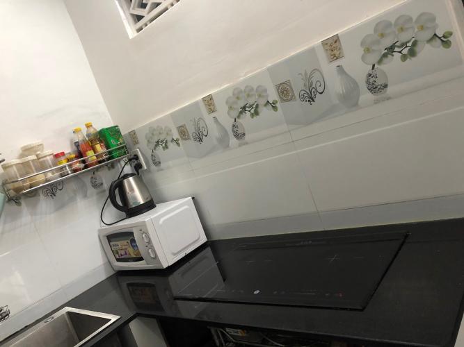 Phòng bếp nhà phố Quận 12 Nhà phố 2 mặt tiền hẻm Quận 12 hướng Đông Nam, diện tích 38.1m2.