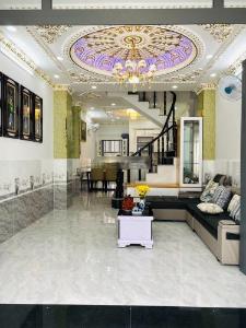 Nhà phố Huyện Nhà Bè Nhà phố đường xe hơi rộng rãi hướng Tây, kết cấu 1 trệt 2 lầu.