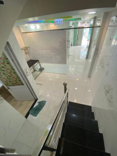 Nhà phố Quận Gò Vấp Nhà phố kết cấu 1 trệt 2 lầu và sân thượng hướng Tây Nam, sổ hồng riêng.