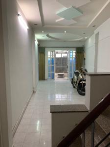 Nhà phố Quận 6 Nhà phố hướng Tây kết cấu 1 trệt 3 lầu, nằm trong khu dân cư văn minh.