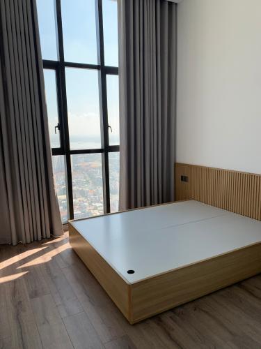 phòng ngủ penthouse riviera point Căn hộ Penthouse Riviera Point tầng cao, ngắm nhìn thành phố.