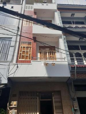 Mặt tiền nhà phố Quận 4 Nhà phố kết cấu 1 trệt 3 lầu hướng Đông, gần ngay cầu Khánh Hội.