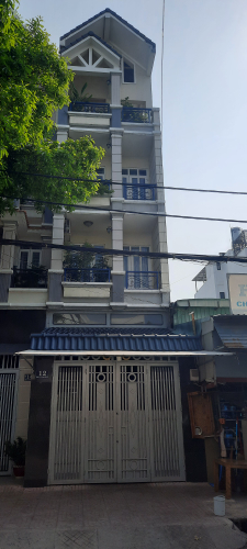 Nhà phố Quận Tân Phú Nhà phố thiết kế 4 tầng đúc kiên cố, khu vực dân cư sầm uất.