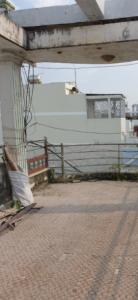 Sân thượng nhà phố Quận 7 Nhà phố hướng Đông Nam đường Gò Ô Môi 3 tầng, nội thất cơ bản.