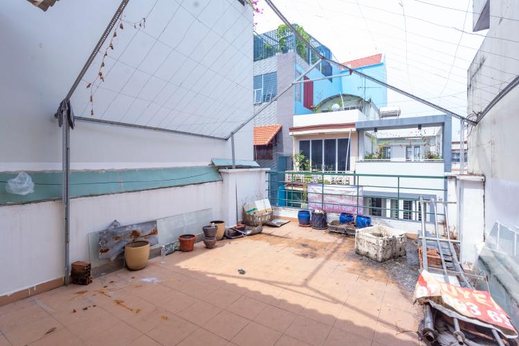 Sân thượng nhà phố Quận 7 Nhà phố hướng Tây diện tích 4mx15m, hẻm xe hơi quay đầu 5m.