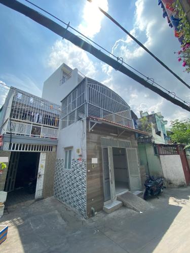 Nhà phố Quận Gò Vấp Nhà phố kết cấu 1 trệt 2 lầu và sân thượng hướng Tây Nam, sổ hồng riêng.