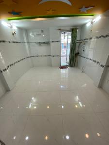 Nhà phố Quận Gò Vấp Nhà phố kết cấu 1 trệt 2 lầu và sân thượng hướng Tây Nam, sổ hồng riêng.