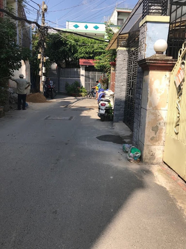 Đường trước đất nền Quận Gò Vấp Đất nền hẻm xe hơi đường Quang Trung, diện tích 126.2m2 có sổ hồng riêng.