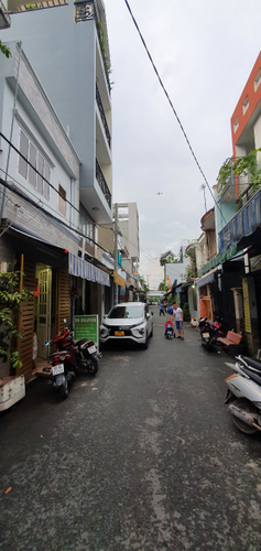 Đường trước nhà phố Quận Bình Tân Nhà thiết kế 1 trệt, 1 gác 3D, 1 lầu đúc kiên cố, khu vực dân cư sầm uất.