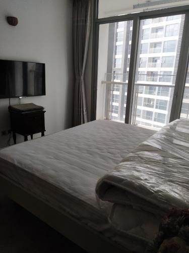 Phòng ngủ Vinhomes Central Park Căn hộ Vinhomes Central Park tầng trung, đầy đủ nội thất