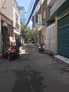 Nhà phố quận Bình Thạnh Bán nhà mặt tiền đường Nguyễn Duy, Q. Bình Thạnh, thuận tiện buôn bán, sổ hồng đầy đủ.