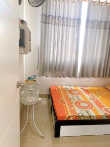 Phòng ngủ căn hộ chung cư Hoàng Kim Thế Gia, Bình Tân Căn hộ Hoàng Kim Thế Gia tầng 6 thoáng mát, đầy đủ nội thất.