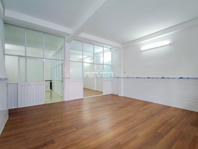 Nhà phố Quận 4 Nhà phố thiết kế 1 trệt, 1 lửng, 1 lầu và sân thượng, không có nội thất.