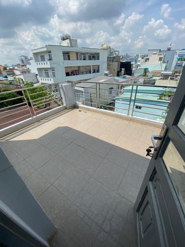 Nhà phố Quận Gò Vấp Nhà phố kết cấu 1 trệt 2 lầu và sân thượng hướng Tây Nam, sổ hồng riêng.