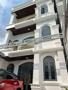 Nhà phố Quận Thủ Đức Nhà phố thiết kế 1 trệt, 2 lầu và sân thượng, khu vực dân cư sầm uất.