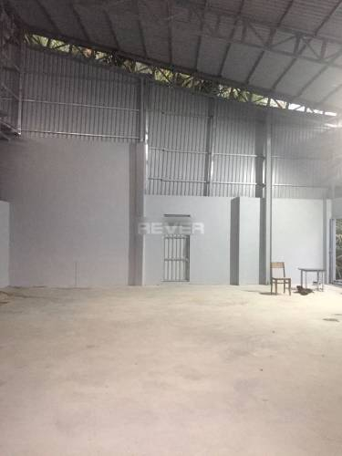 Nhà xưởng kho bãi Huyện Bình Chánh Nhà xưởng kho bãi diện tích 400m2, có văn phòng và bãi xe, khu vực an ninh.