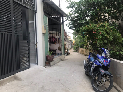 Đường trước nhà phố Quận Thủ Đức Nhà phố thiết kế 1 trệt, 1 lầu cửa hướng Bắc, đón gió mát quanh năm.