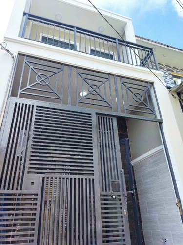 Mặt tiền nhà phố Quận Thủ Đức Nhà phố thiết kế 1 trệt, 1 lầu cửa hướng Bắc, đón gió mát quanh năm.