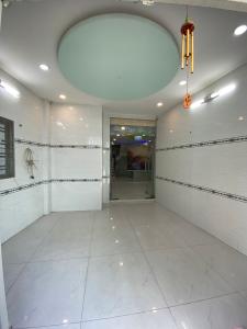 Nhà phố Quận Gò Vấp Nhà phố kết cấu 1 trệt 2 lầu và sân thượng hướng Tây Nam, sổ hồng riêng.