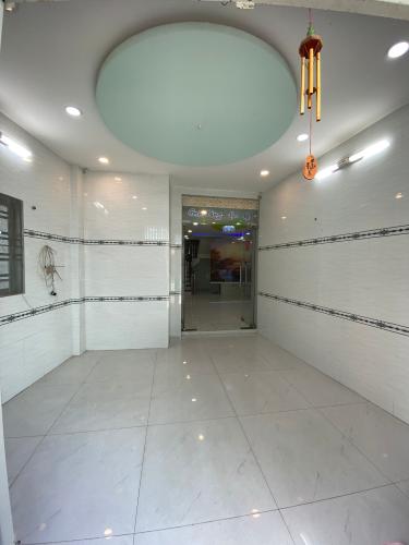 Nhà phố Quận Gò Vấp Nhà phố kết cấu 1 trệt 2 lầu và sân thượng hướng Tây Nam, sổ hồng riêng.