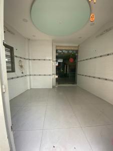 Nhà phố Quận Gò Vấp Nhà phố kết cấu 1 trệt 2 lầu và sân thượng hướng Tây Nam, sổ hồng riêng.