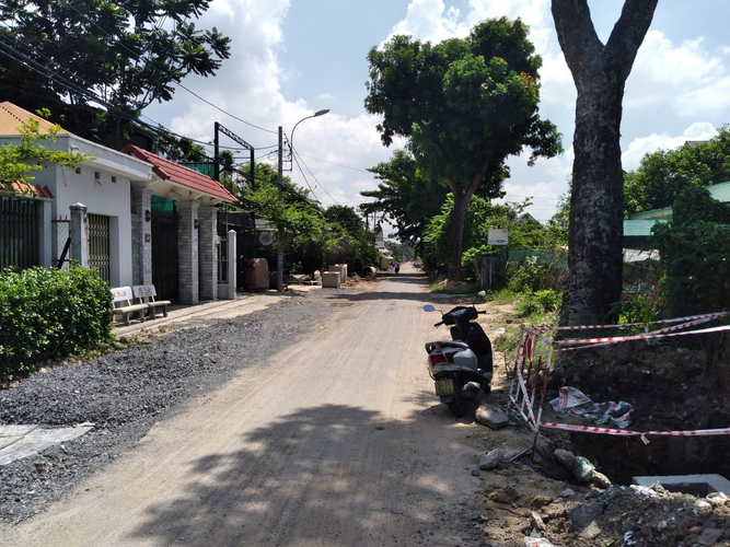 Đường trước đất nền Huyện Củ Chi Đất nền mặt tiền đường Nguyễn Thị Sẳng, diện tích 261m2 vuông đẹp.
