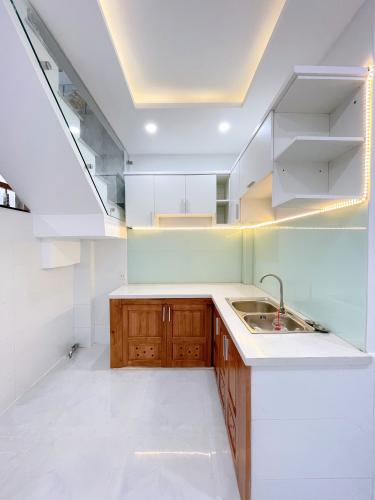 Phòng bếp nhà phố Quận Gò Vấp Nhà phố hướng Tây Bắc hẻm xe hơi, cách chợ Hạnh Thông Tây 1km.