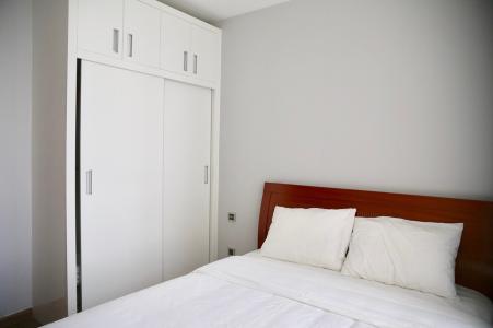 phòng ngủ căn hộ Vinhomes Central Park Căn hộ Vinhomes Central Park tầng 10 nội thất đầy đủ, sàn lót gỗ