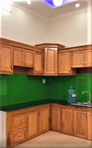 Nhà phố Quận Bình Tân Nhà phố thiết kế 1 trệt và 2 lầu kiên cố, cửa hướng Tây đón nắng sớm.