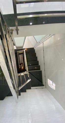 Nhà phố Quận Gò Vấp Nhà phố kết cấu 1 trệt 2 lầu và sân thượng hướng Tây Nam, sổ hồng riêng.