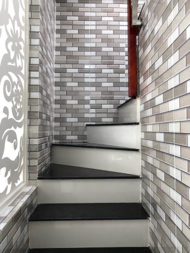 cầu thang nhà phố quận 1 Nhà hẻm Quận 1 diện tích 3x8m, pháp lý sổ hồng chính chủ.