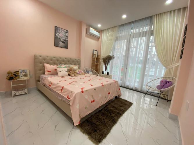 Phòng ngủ nhà phố Phú Nhuận Bán nhà phố 3 tầng mặt tiền đường Thích Quảng Đức, phường 4, Phú Nhuận, diện tích đất 61.3m2, diện tích sàn 210m2.