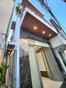 Nhà phố Đường Hưng Phú 2 tầng diện tích 25.8m² hướng đông bắc pháp lý sổ hồng.