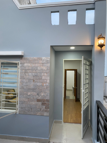 Nhà phố Quận Gò Vấp Nhà phố thiết kế 2 tầng diện tích 53m2, cửa hướng Bắc mát mẻ.