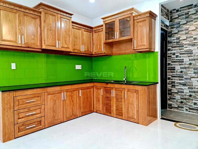 Nhà phố Quận Bình Thạnh Nhà hẻm xe hơi đường Nơ Trang Long thiết kế 1 trệt, 1 lửng và 3 lầu.