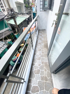 Nhà phố Quận Gò Vấp Nhà phố thiết kế 1 trệt, 2 lầu kiên cố, ngay trường ĐH Công Nghiệp.