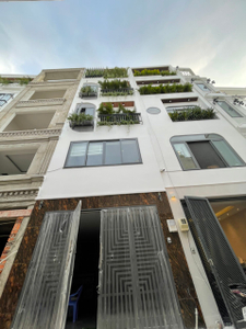 Nhà phố Quận Gò Vấp Nhà phố có cửa hướng Đông Bắc thoáng mát, có sổ hồng riêng bàn giao ngay.